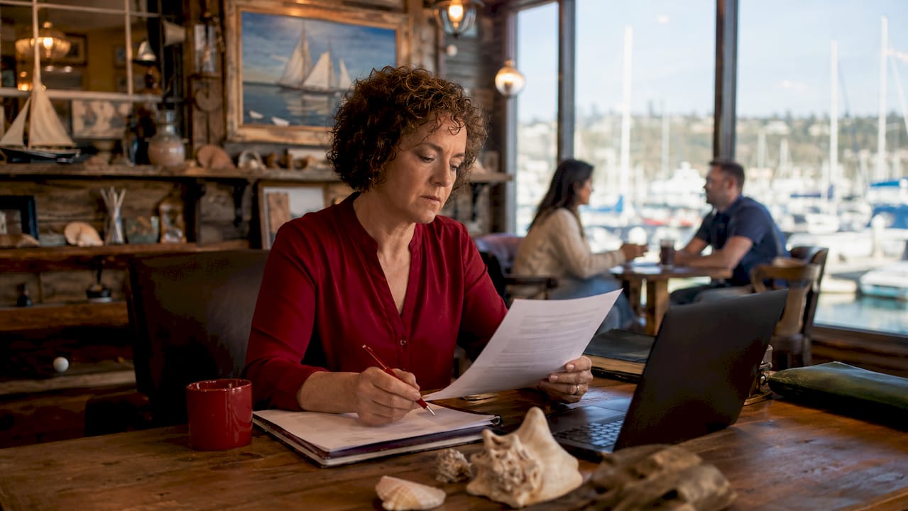 Agent reviewing yacht insurance documents