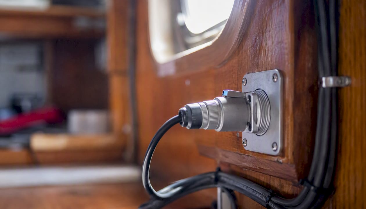 Close-up of marine pilot plug on ship bridge