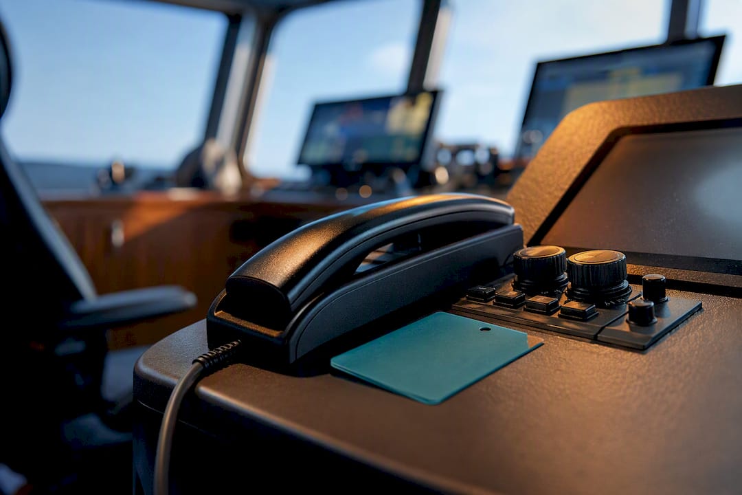 Marine radio console in vessel wheelhouse